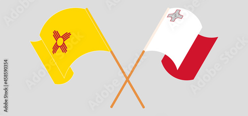 Crossed and waving flags of the State of New Mexico and Malta