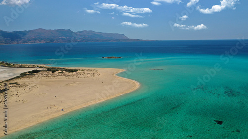Aerial drone photo of paradise sandy bay and beach of Pounta next to popular island of Elafonisos, Peloponnese, Greece