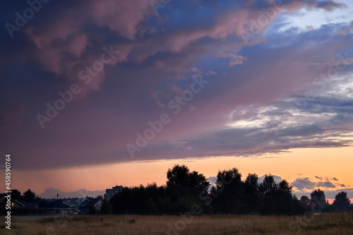 Dramatic sky on summer sunset. Beautiful clouds. © sergofan2015