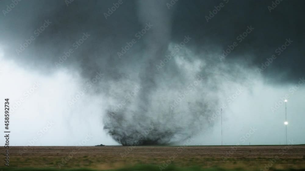 A Tornado Churns In A Field During An Outbreak Of Severe Storms