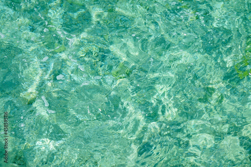 Crystalline water of the mediterranean sea, looking like marble texture
