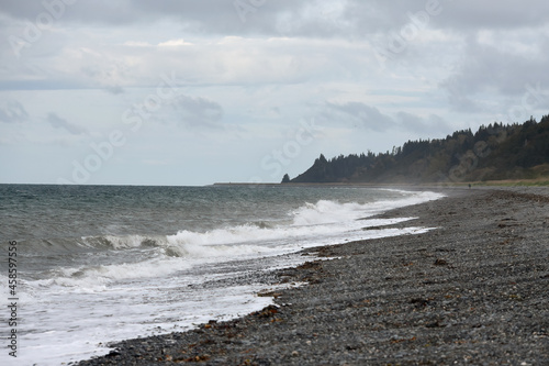 Waves crash onto the shore of Cook Inlet near Homer, Alaska.