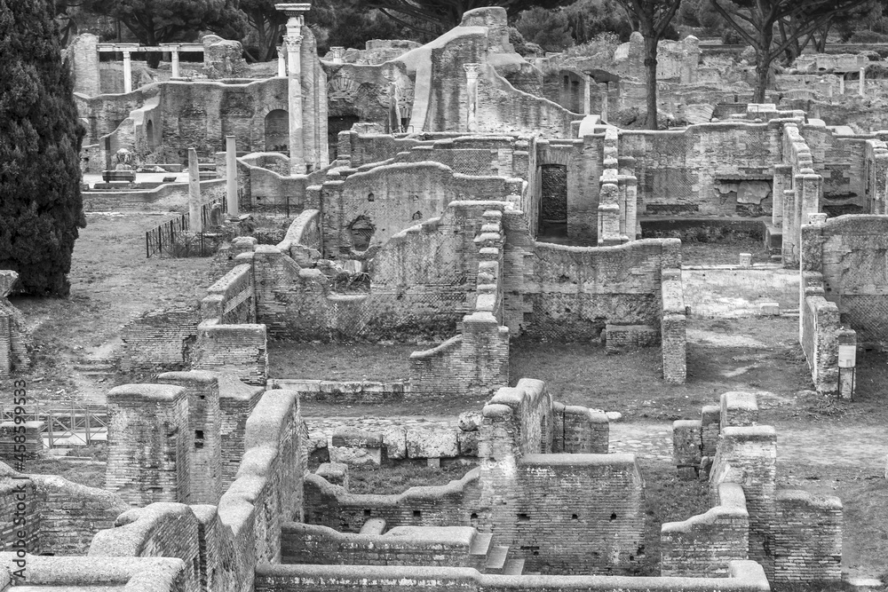 The ruins of the ancient antique Italian city of Ostia Antica. Black and white photography