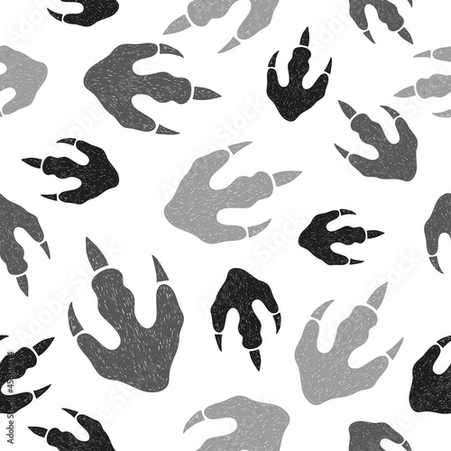 Dinosaur footprints seamless pattern. Vector black and white doodle illustration