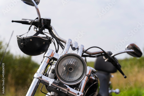 Motorcycle front view, motorcycle headlight, motorcycle front parts, shiny chrome