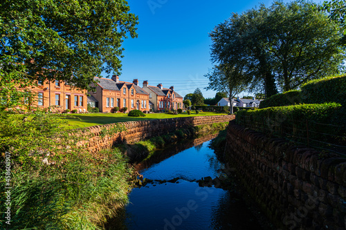 A view of the stream Pow water running through the picturesque village of Powfoot on the Dumfries & Galloway coastline