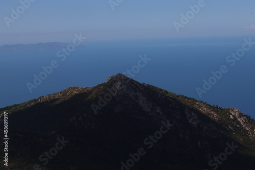 Elba, Italy – September 01, 2021: beautiful places from Elba Island. Aerial view to the island. Little famous villages near the beaches. Summer tourist places. Clouds and blue sky in the background.