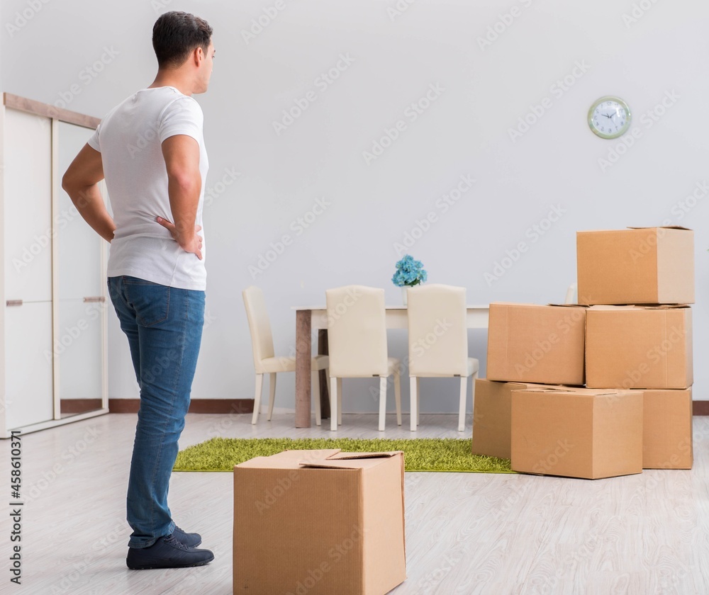 Man caryying boxes at home Man caryying boxes at home