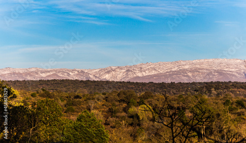 panoramic view of the snowy mountain ranges in the Calamuchita Valley, Cordoba, Argentina photo