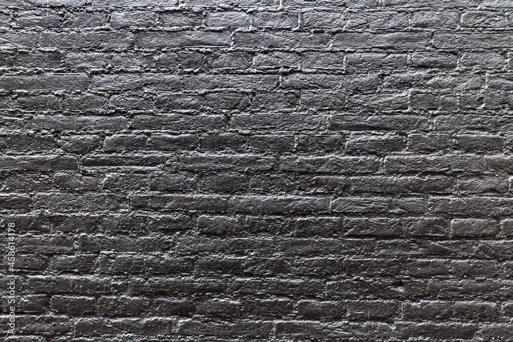 Black brick wall background, dark backdrop Black brick wall background, dark backdrop