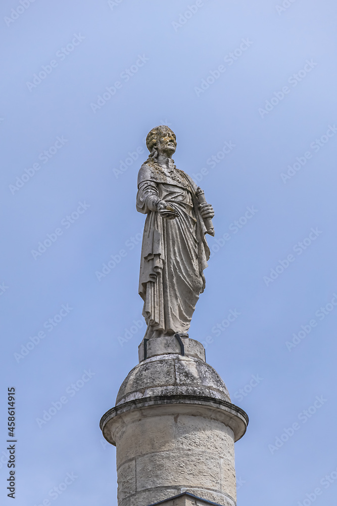 Louis-XVI column in Nantes (1823), installed in center of Place Marechal-Foch - column twenty-eight meters high, surmounted by a statue of King of France Louis XVI. Nantes, Loire Atlantique, France.