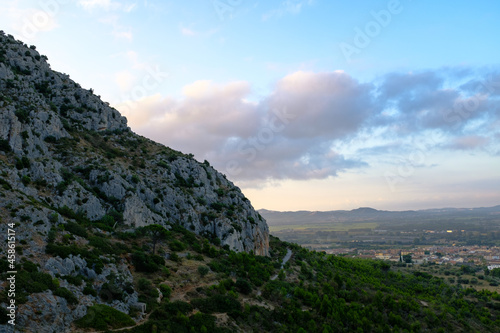 Scenic view from top of rock mountain in Montgri, Catalonia, Costa Brava, on a sunny morning photo