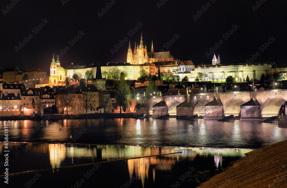 The View on Prague gothic Castle with Charles Bridge at Night, Czech Republic