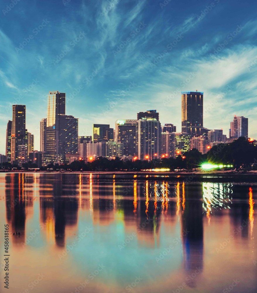 Fototapeta premium miami florida city skyline reflections buildings Apartments skyscrapers water sea beach colors lights panorama bridge sky 