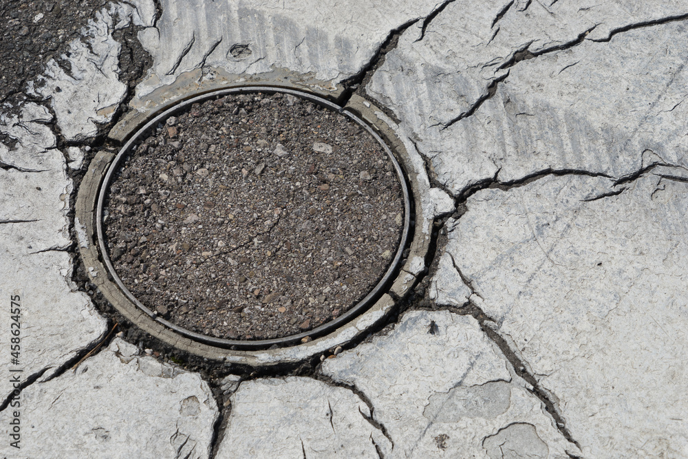 Grey aged concrete background with cracks Grey aged concrete background with cracks