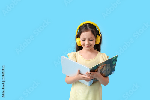 Little girl with headphones...