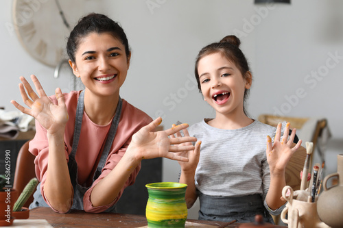 Little girl with her mother...