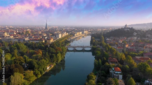 Turin city skyline aerial view fly over city downtown torino, turin italy drone footage.