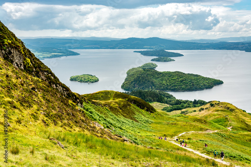 A view of Loch Lomond from the West highland Way in scotland. The hiking path descends to the lake from Conic Hill