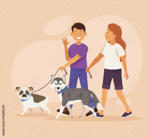 couple walking with dogs