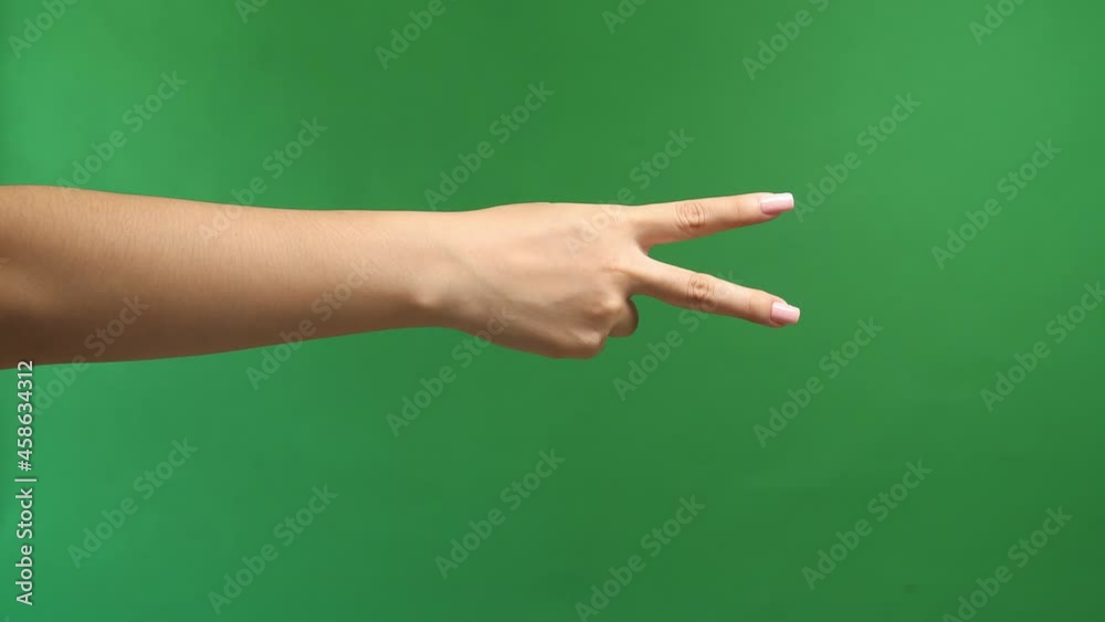 Woman'S Hand Is Show Two Fingers Up On Green Screen Background. Finger Symbols Of Peace Strength Fight, Victory Symbol, Letter V In Sign Language Or Number Two Or Second
Woman'S Hand Is Show Two Fingers Up On Green Screen Background. Finger Symbols Of Peace Strength Fight, Victory Symbol, Letter V In Sign Language Or Number Two Or Second