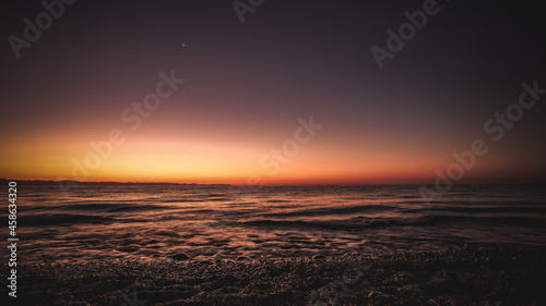 rocky coast of the mediterranean sea at dawn