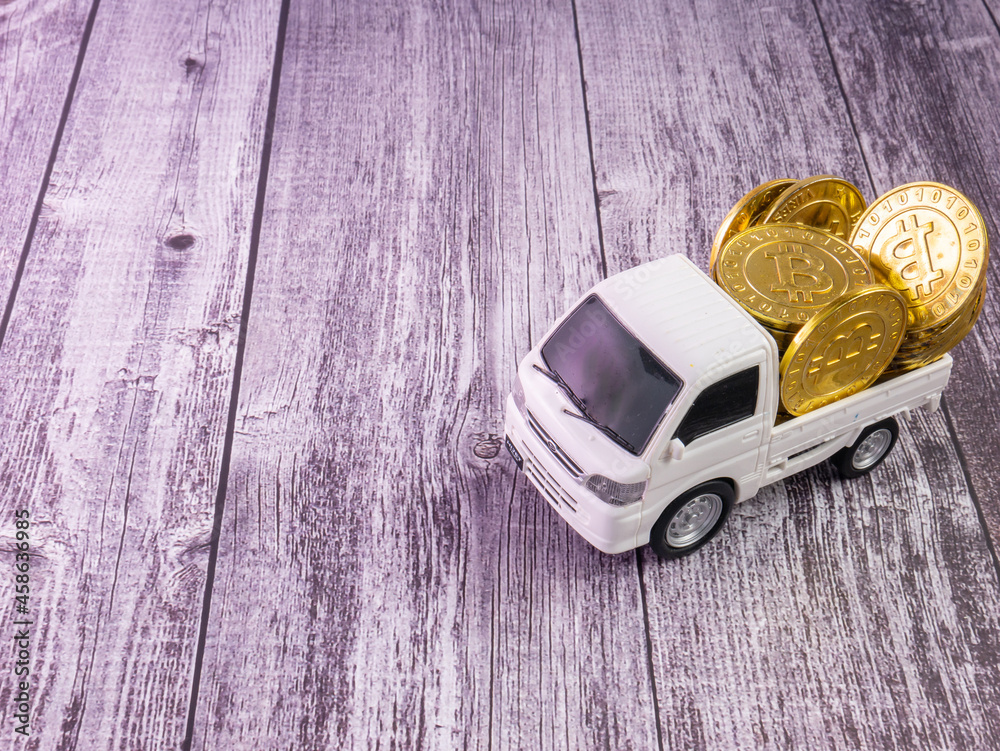 white van truck and gold coins for business or transport concept white van truck and gold coins for business or transport concept
