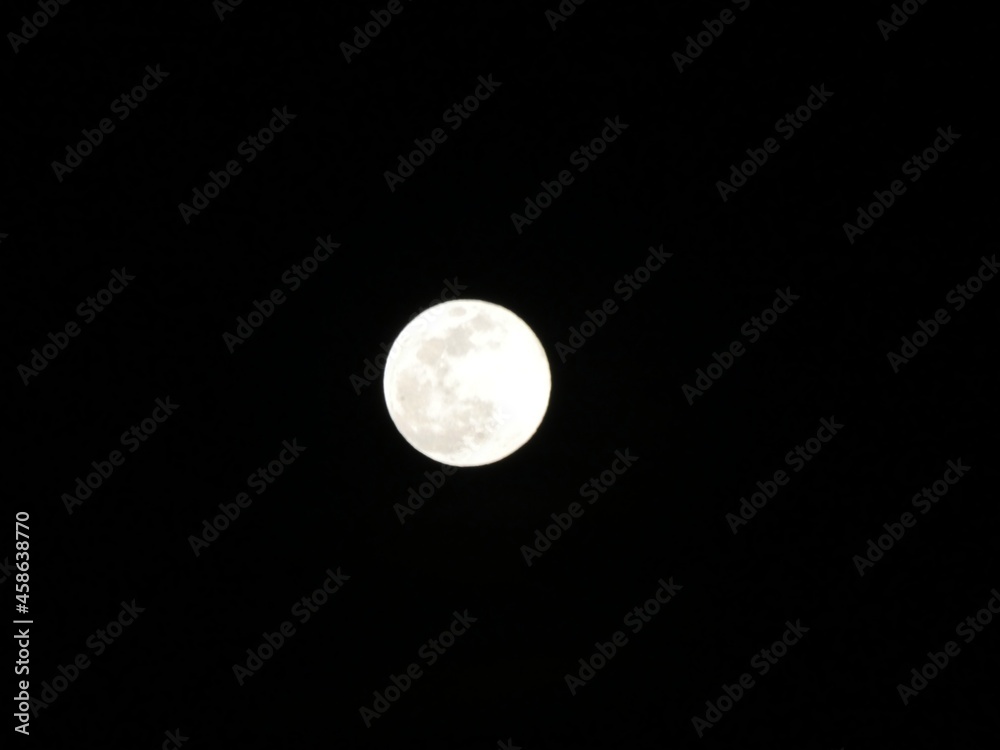 Full round moon, dark skies background Full round moon, dark skies background
