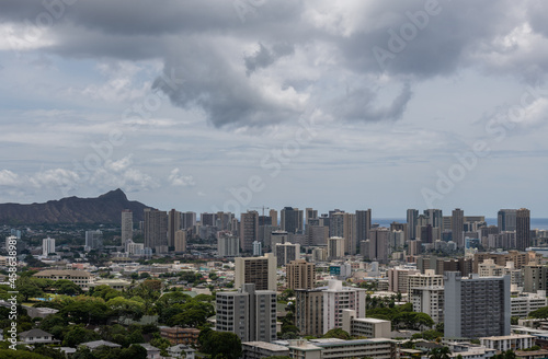 Scenic aerial Honolulu vista with the Diamond Head in the background on a rainy day, Oahu, Hawaii