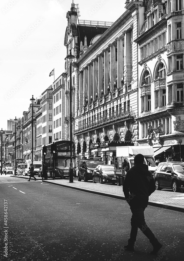 London street, walking man, UK, city, architecture, building, town, house, buildings, old, europe, urban, travel, road, black and white, people, window, alley, narrow, church, sky