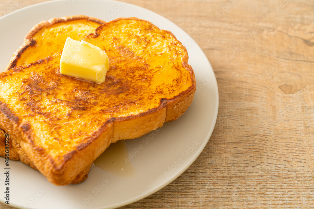 French toasted with butter and honey French toasted with butter and honey