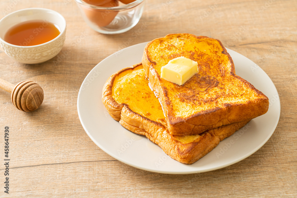 French toasted with butter and honey French toasted with butter and honey