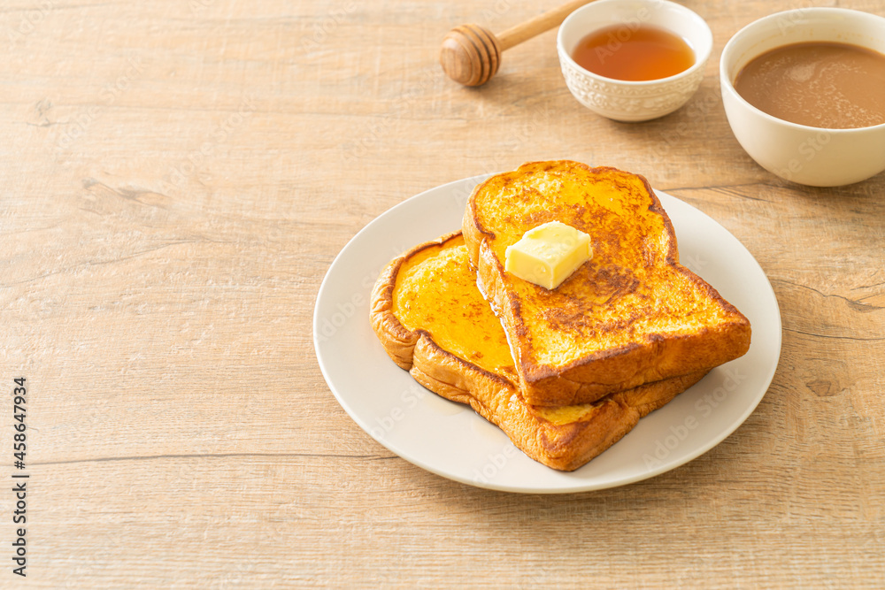 French toasted with butter and honey