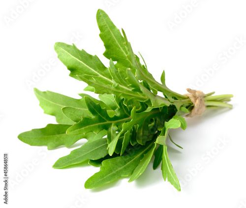 bunch of fresh rocket leaves isolated on white background