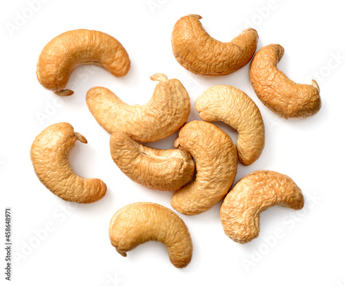 roasted cashew nuts isolated on the white background, top view