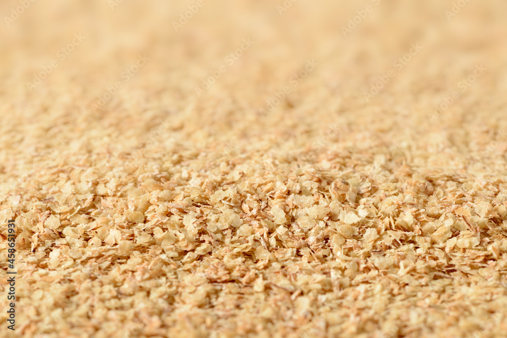 food background of uncooked wheat germ food background of uncooked wheat germ