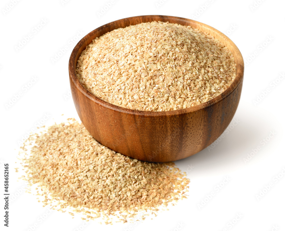 uncooked wheat germ in the wooden bowl, isolated on the white background