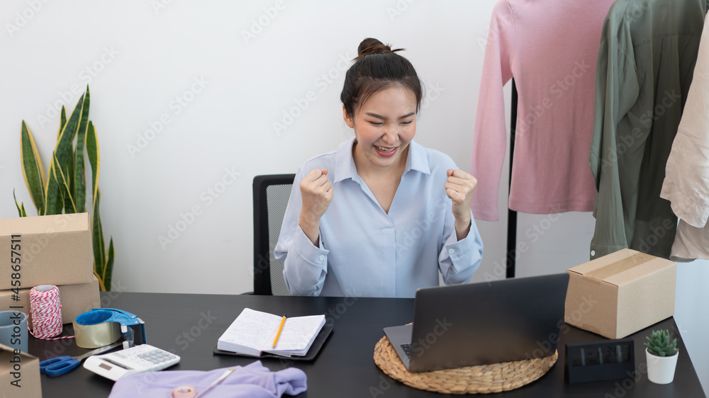 Live shopping concept a female seller feeling delighted to her success after the sale reaching the goal Live shopping concept a female seller feeling delighted to her success after the sale reaching the goal