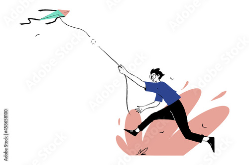 Boy running after disconnected kite