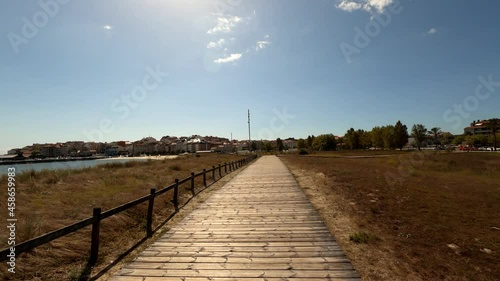 Traveling from wooden walkway to Portonovo beach, in galicia, Spain. photo