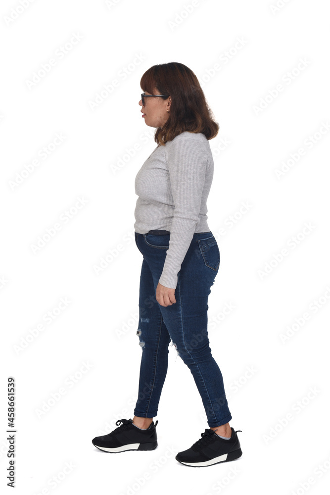 full portrait of a woman walking on white background full portrait of a woman walking on white background