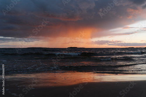 Epic Sunset trough a little rain in Finnish Beach