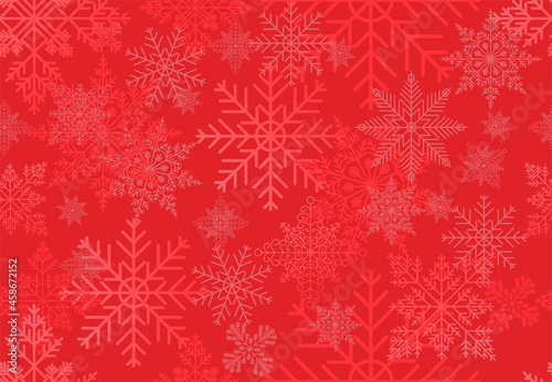 Seamless winter background with snowflakes on a red background.
