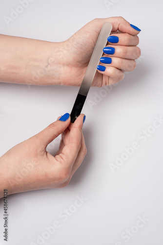 hand holding a a nail file