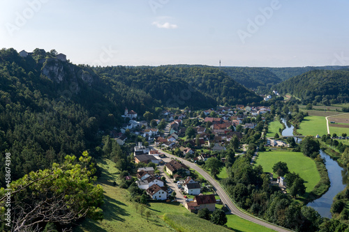 panoramic view over little city in a valley surrounded by hills in germany