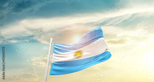 Argentina national flag cloth fabric waving on beautiful sky - Image