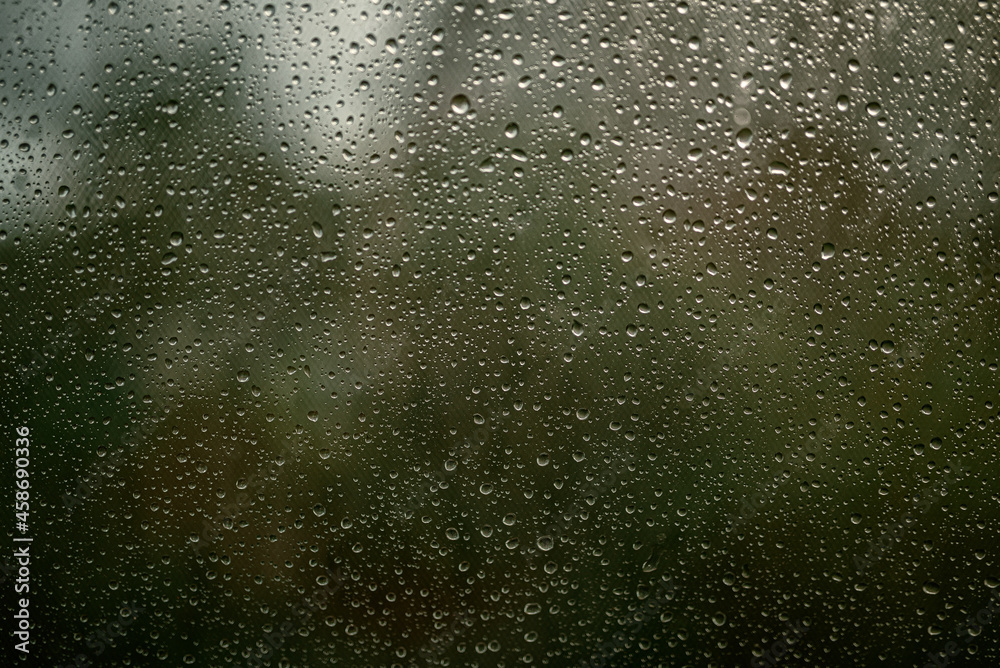 raindrops on the window. Selective focus. Abstract background for design and project