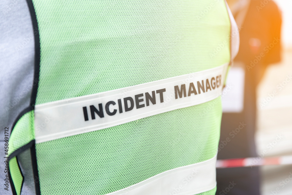 close up text incident manager on shirt - obrazy, fototapety, plakaty 