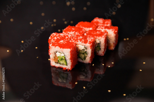 appetizing sushi on a black background