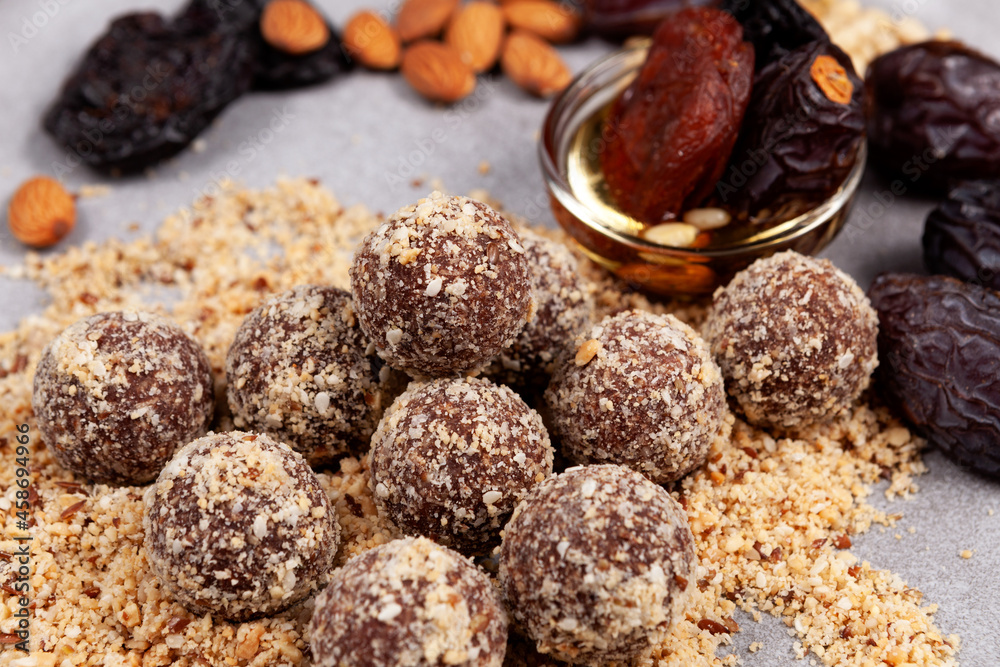 Homemade Energy balls. Healthy sweets or fitness snack without sugar, close-up. Homemade Energy balls. Healthy sweets or fitness snack without sugar, close-up.